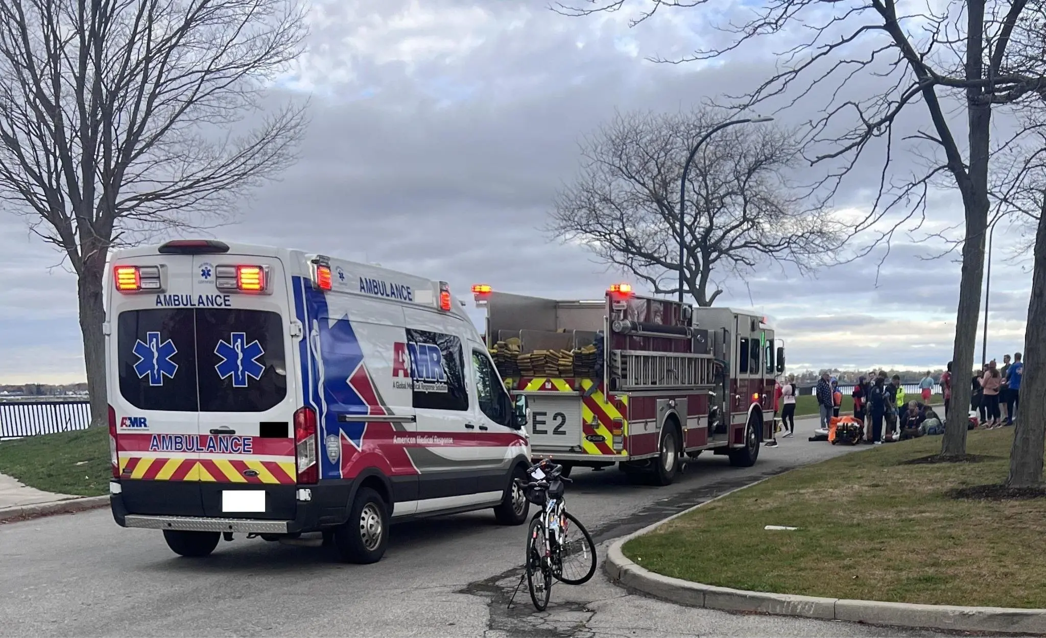 Event marshals coordinating with emergency services at an event